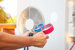 HVAC technician inspecting an AC unit in Marion County, Florida