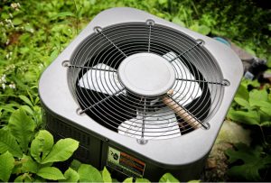 Broken air conditioning condenser outside of a house in Ocala, Florida